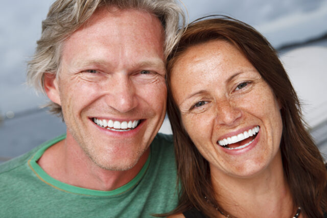 Closeup of a happy middle aged couple together.